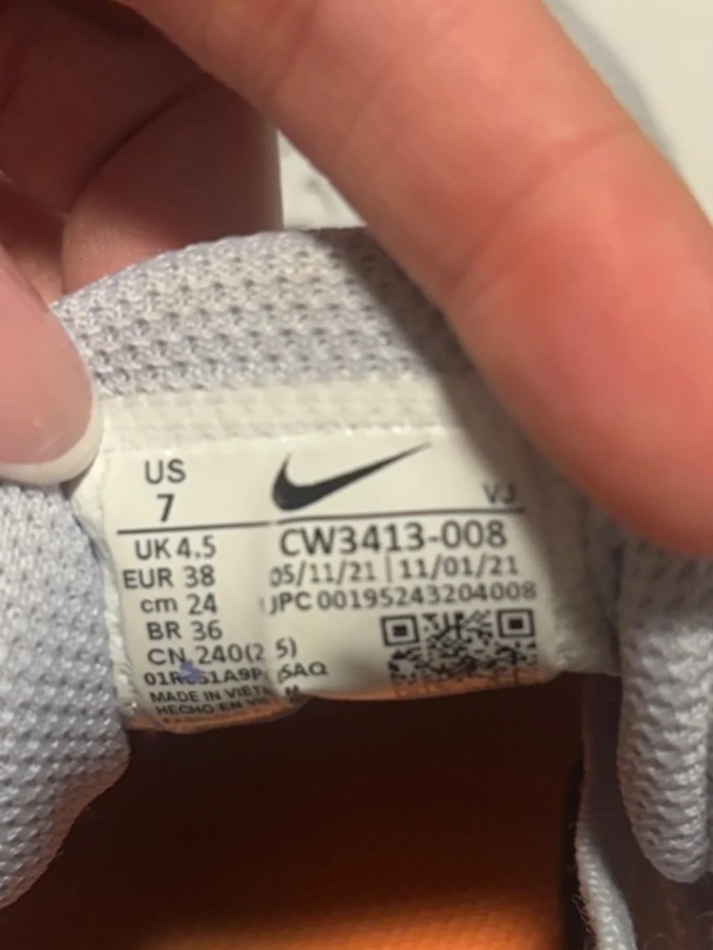 Nike Downshifter Running Shoes with Purple Swoosh and Orange Accents